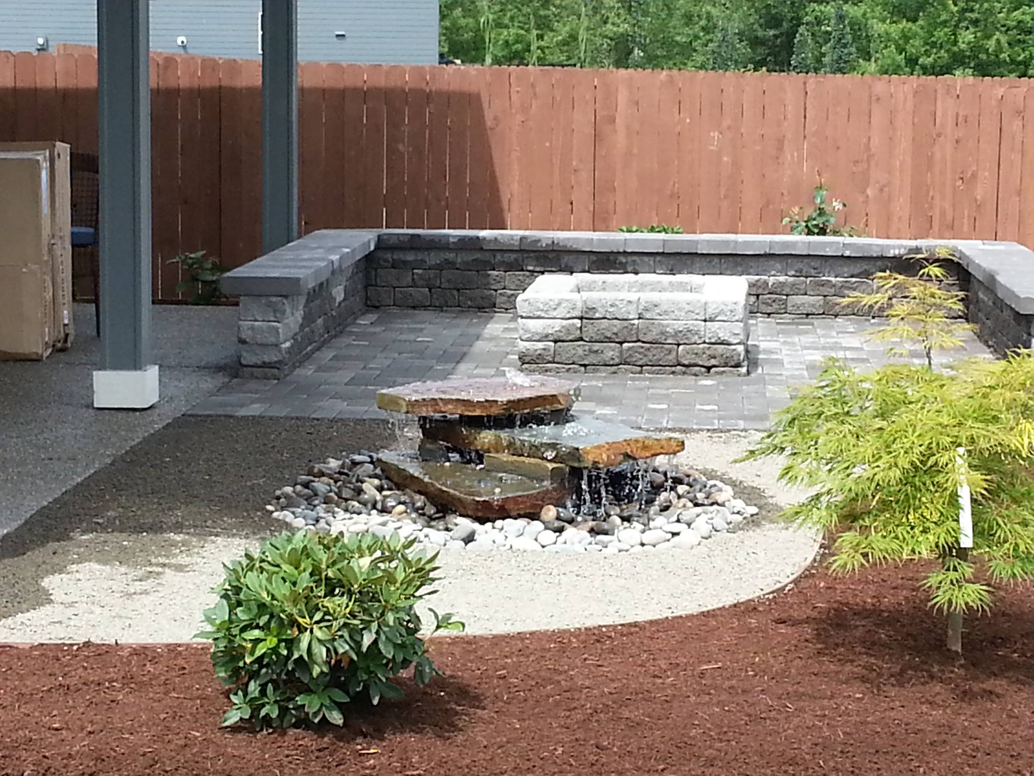 ponds waterfalls and water features-new home landscaping-outdoor living clark county washington- patios- waterfeatures- seat wall