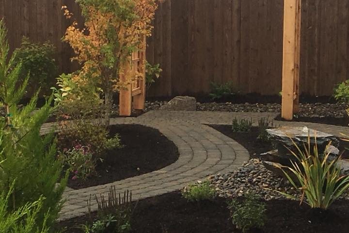 new home landscaping-Vancouver WA- Backyard Landscaping, water feature- paver pathways- planting- pergola