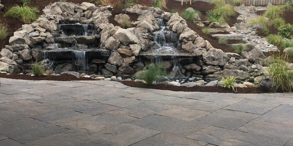 top rated local landscaper-paver patios- hardscapes- water feature- landscaping